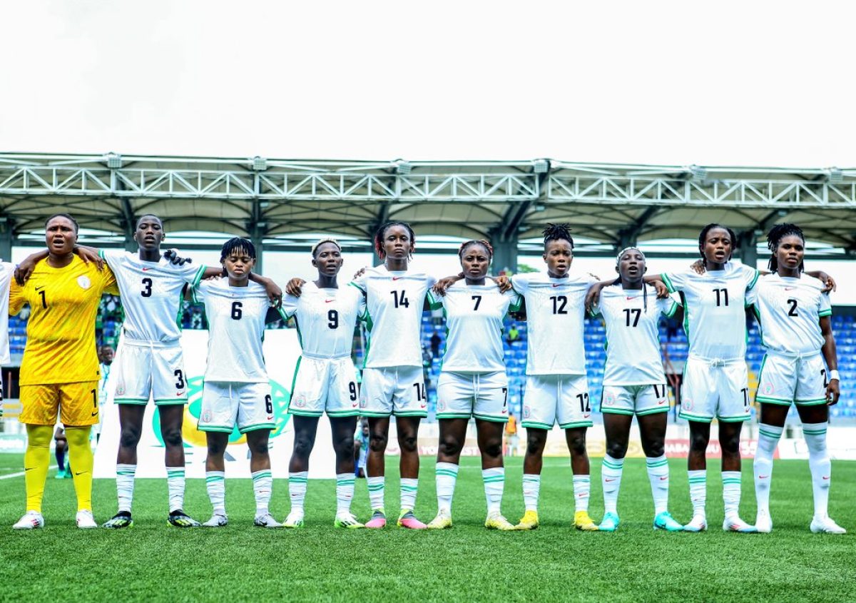 Nigeria's Female Football Team, The Super Falcons, in their white jersey lining up for their match against Algeria