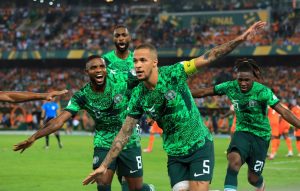 The Nigerian Football team, The Super Eagles, celebrating after scoring a goal