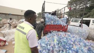 plastic PET bottles moved out of a truck